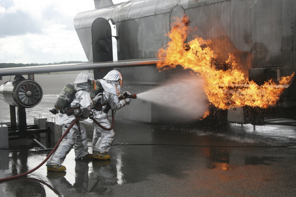 Firefighters extinguish an exterior fire during a training exercise Canvas Art - Stocktrek Images (34 x 23)