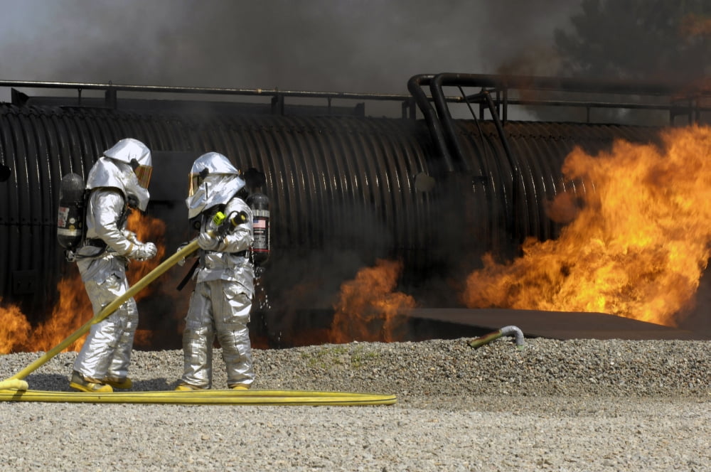 Firefighters neutralize a live fire Canvas Art - Stocktrek Images (34 x 23)