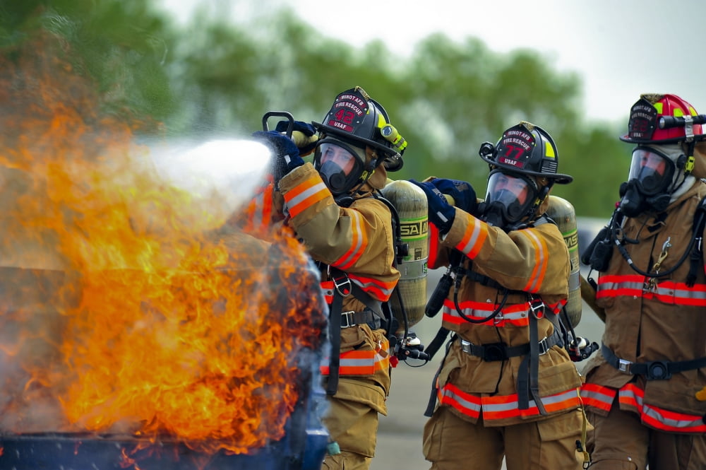 Firefighters put out a fire during at Minot Air Force Base North Dakota Canvas Art - Stocktrek Images (34 x 23)