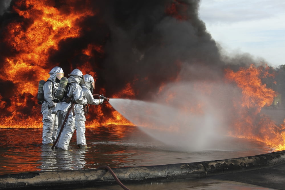 Firefighting Marines battle a huge blaze Canvas Art - Stocktrek Images (35 x 23)