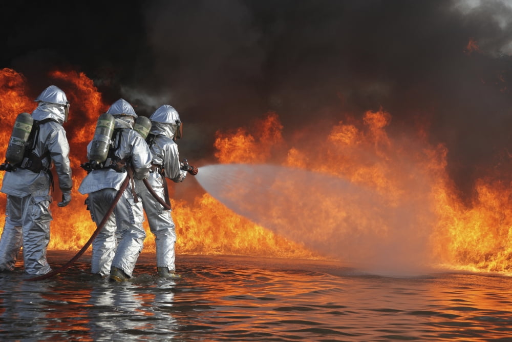Firefighting Marines battle a huge blaze Canvas Art - Stocktrek Images (35 x 23)