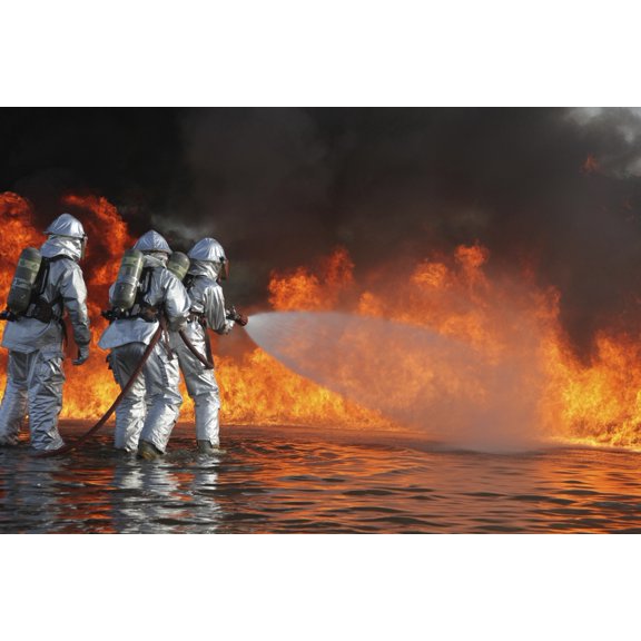 Firefighting Marines battle a huge blaze Canvas Art - Stocktrek Images (35 x 23)