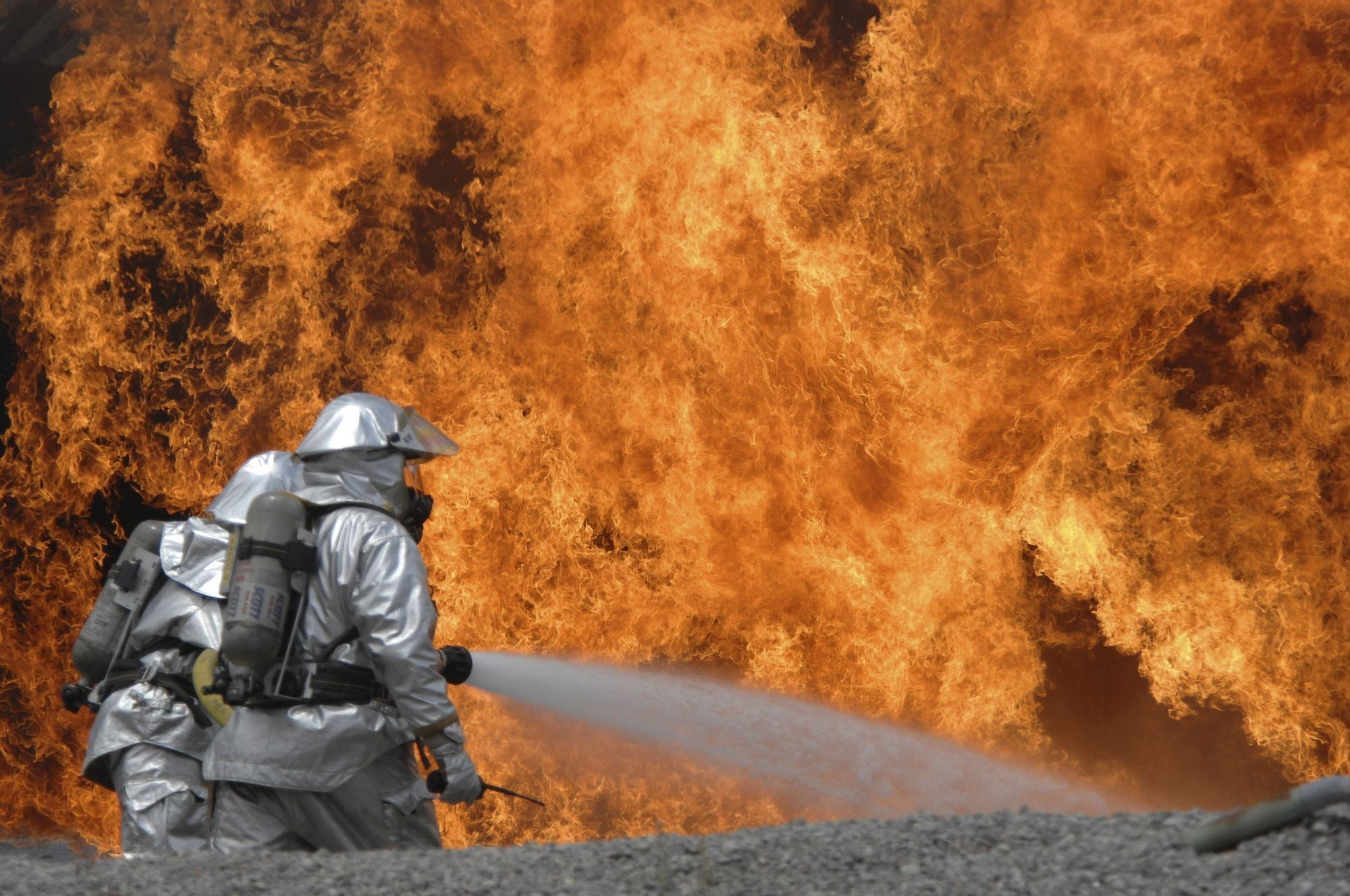 Firemen neutralize a fire Canvas Art - Stocktrek Images (34 x 23)