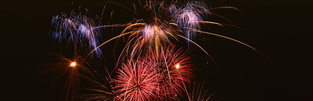 Fireworks exploding against night sky Canvas Art - Panoramic Images (27 x 9)