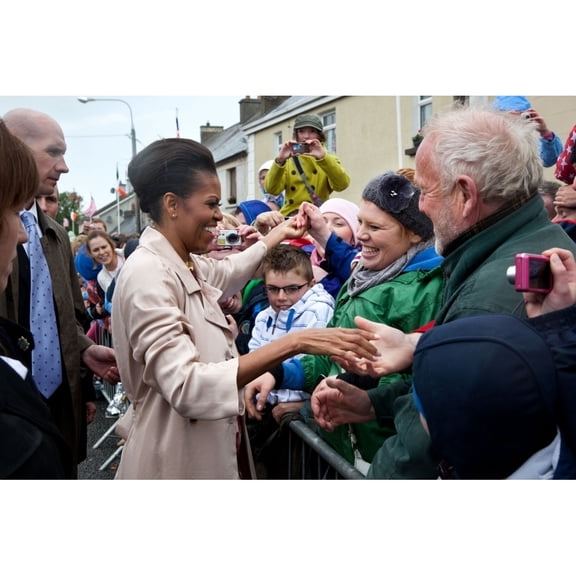 First Lady Michelle Obama Greets Local Residents On Main Street In Moneygall History (24 x 18)