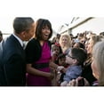 thumbnail image 1 of First Lady Michelle Obama Reacts While Talking With People Along A Rope Line. She And President Barack Obama Were At, 1 of 2