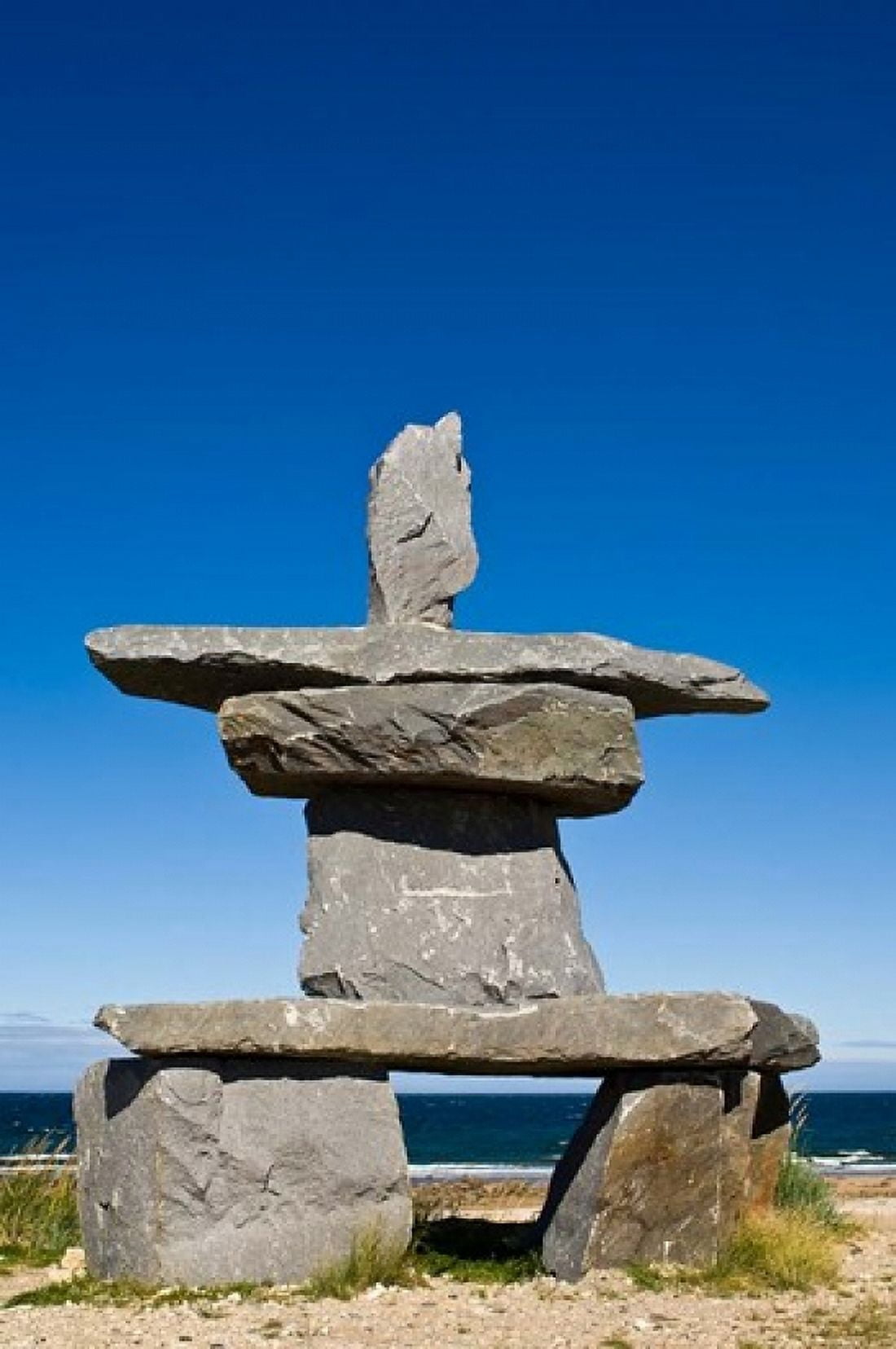 First Nations Inukshuk Canvas Art - Michael DeFreitas DanitaDelimont (14 x 21)