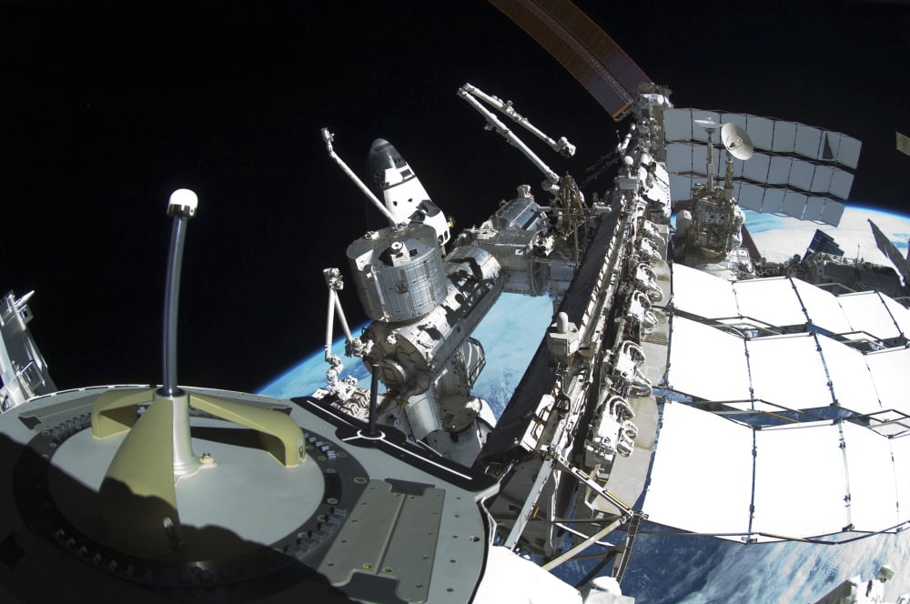 Fish-eye lens view of a portion of the International Space Station Canvas Art - Stocktrek Images (34 x 23)