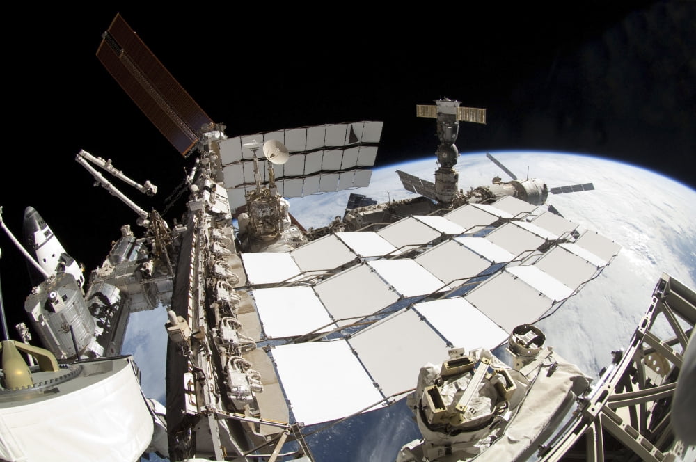 Fish-eye lens view of a portion of the International Space Station Canvas Art - Stocktrek Images (34 x 23)