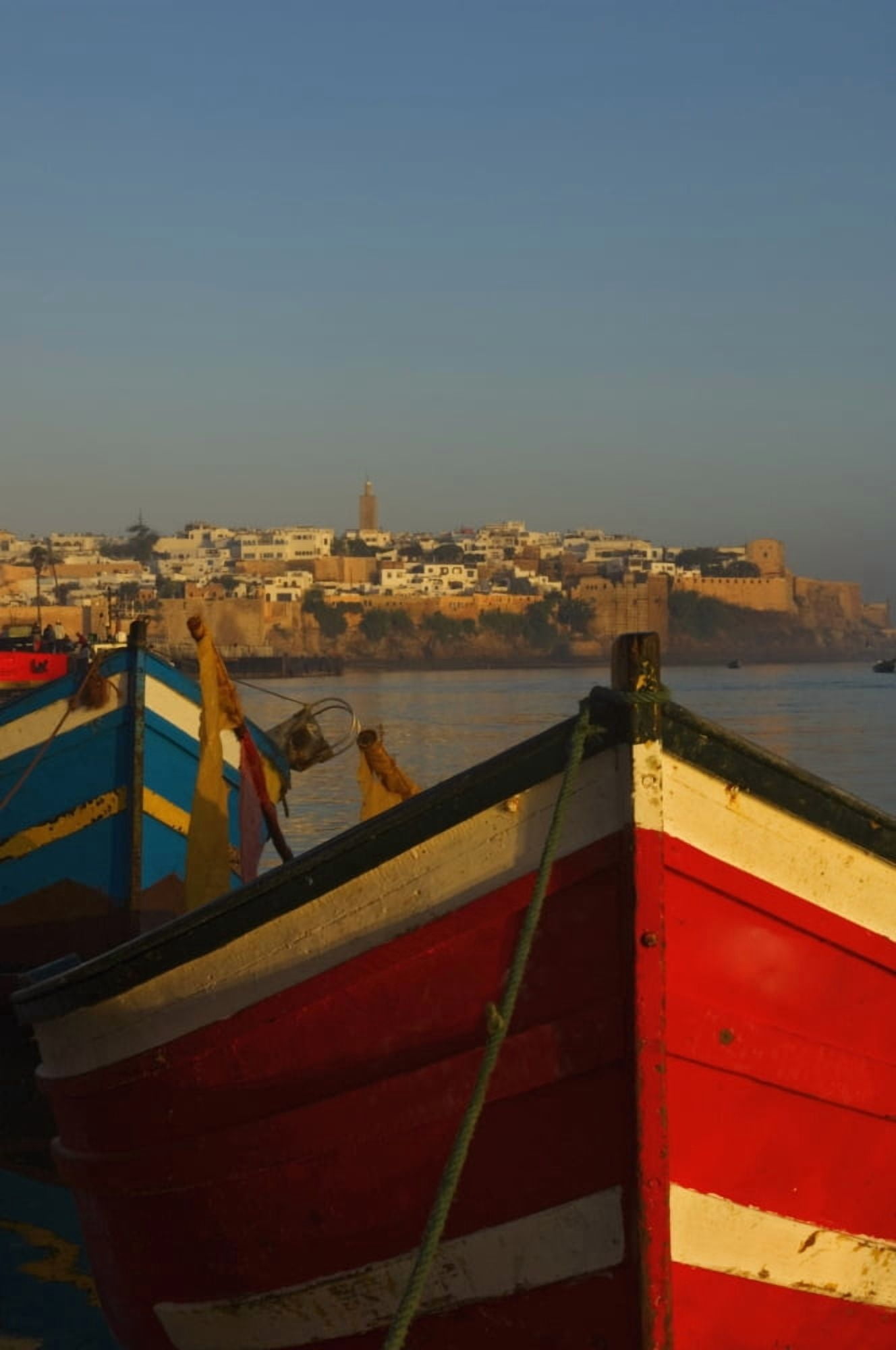 Fishing Boats In Front Of Kasbah Des Oudaias Canvas Art - Chris Parker Design Pics (12 x 19)