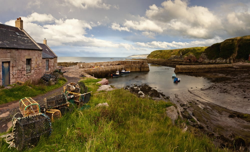 Fishing Traps A House And Boats Mooring On The Coast Cove Lothian Scotland Canvas Art - John Short Design Pics (19 x 12)