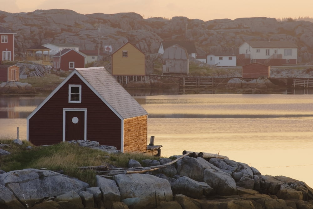 Fishing Village Along The Waters Edge At Sunset Fogo Island Newfoundland Canada Canvas Art - Jacques Laurent Design Pics (19 x 12)