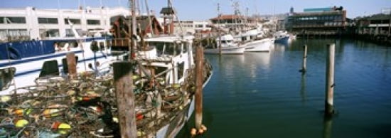 Fishing boats at a dock Fishermans Wharf San Francisco California USA Canvas Art - Panoramic Images (36 x 13)