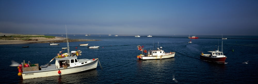 Fishing boats in an ocean Cape Cod Chatham Barnstable County Massachusetts USA Canvas Art - Panoramic Images (36 x 12)