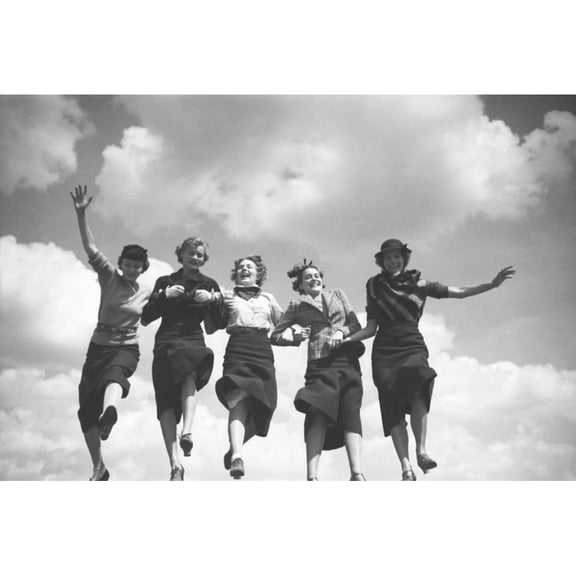Five Fashion Models Holding Hands And Walking In A Row With The Sky As Backdrop. August 1935 History