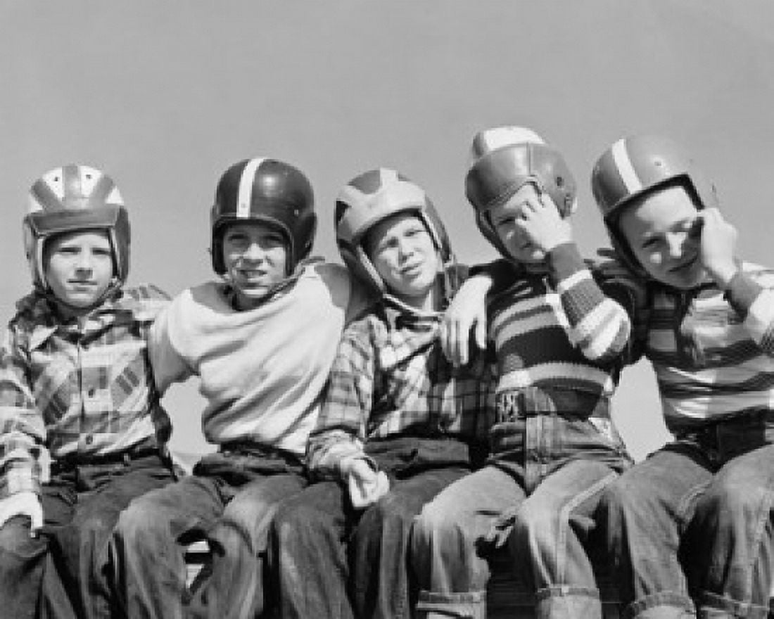 Five boys wearing sports helmets and sitting together Canvas Art - (18 x 24)