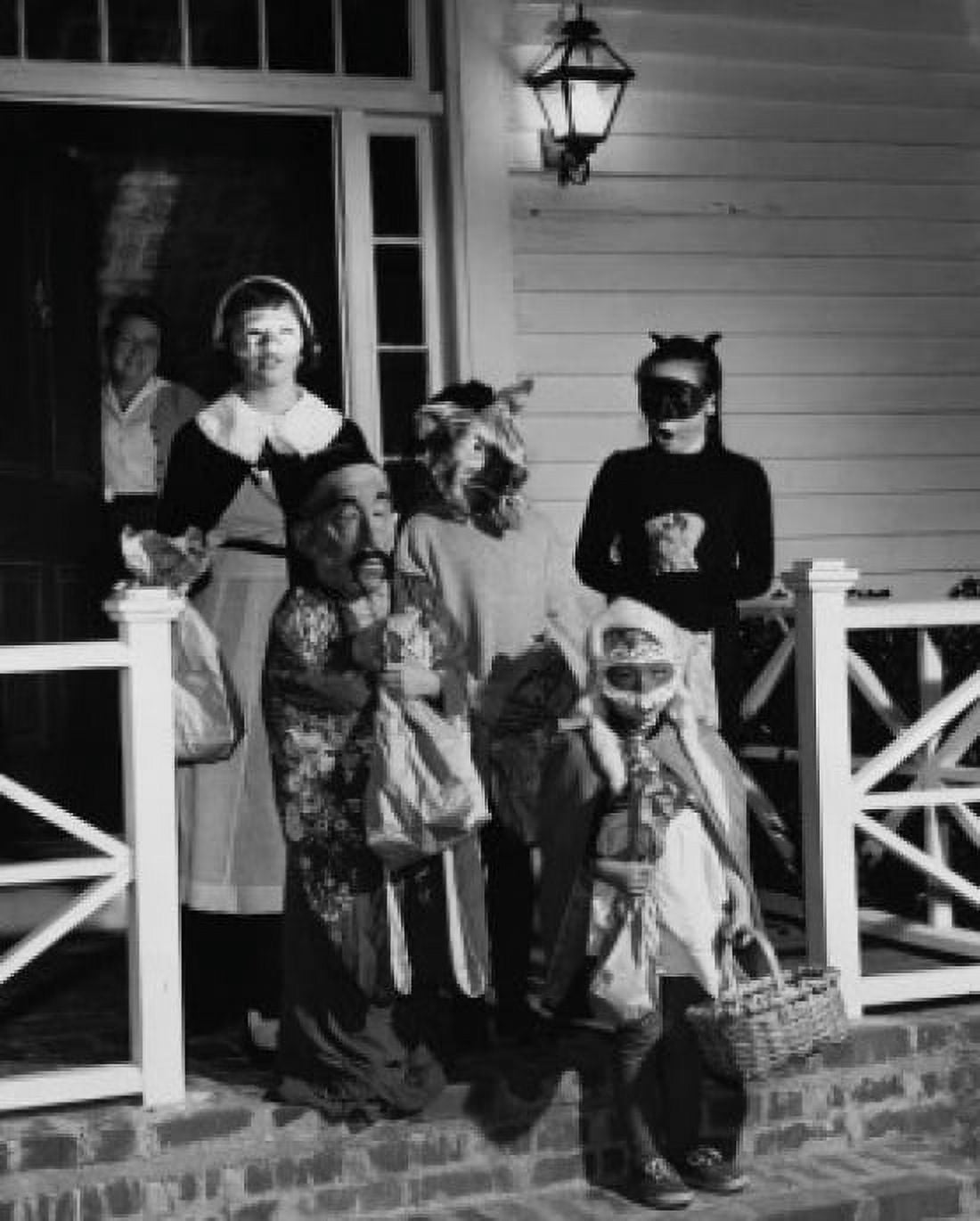 Five children wearing Halloween costumes for trick or treating Canvas Art - (18 x 24)