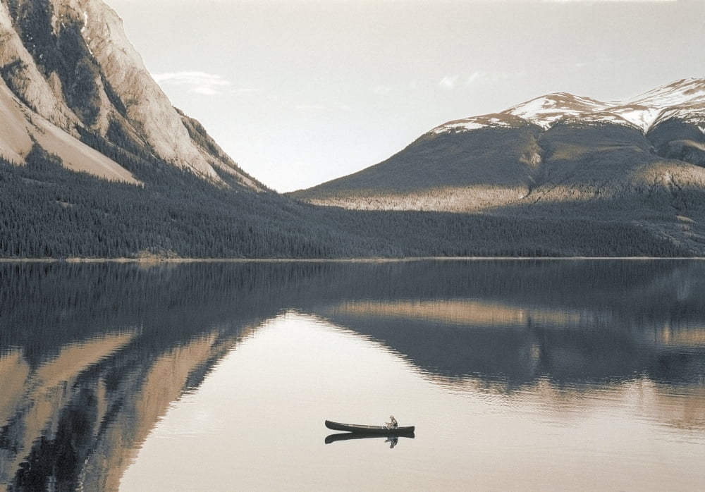 Fl5493 Darwin Wiggett Canoeist On Calm Lake Surrounded By Mountains Canvas Art - Darwin Wiggett Design Pics (32 x 22)