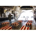 thumbnail image 1 of Flag Draped Coffins Of Five Us Soldiers Killed At Fort Hood. 13 Were Killed And 38 Injured On Nov. 5 2009 By Us Army Major Nidal Malik Hasan An American-Born Muslim Of Palestinian Descent., 1 of 1