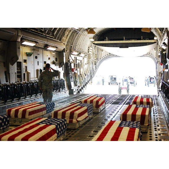 Flag Draped Coffins Of Five Us Soldiers Killed At Fort Hood. 13 Were Killed And 38 Injured On Nov. 5 2009 By Us Army Major Nidal Malik Hasan An American-Born Muslim Of Palestinian Descent.