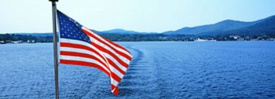 Flag and view from the Minne Ha Ha Steamboat Lake George New York State USA Canvas Art - Panoramic Images (36 x 13)
