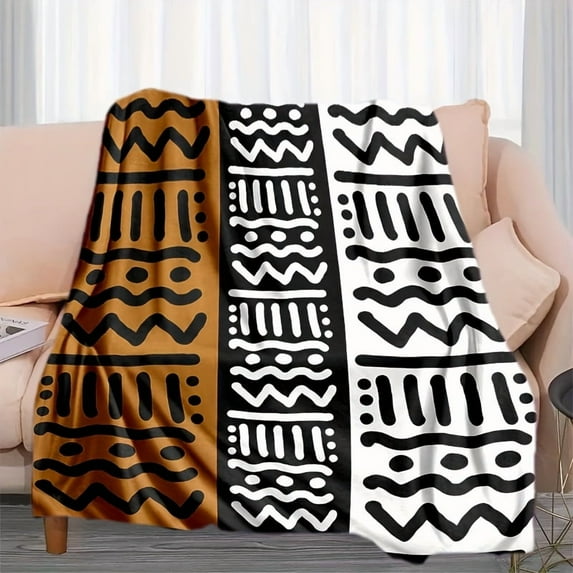 This Flannel Blanket Is Inspired by African Tribal Style, Showcasing The Classic Combination of Black, White And Brown Colors. The Pattern Is Simple Yet Rhythmic