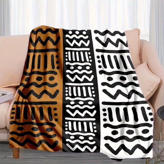 This Flannel Blanket Is Inspired by African Tribal Style, Showcasing The Classic Combination of Black, White And Brown Colors. The Pattern Is Simple Yet Rhythmic