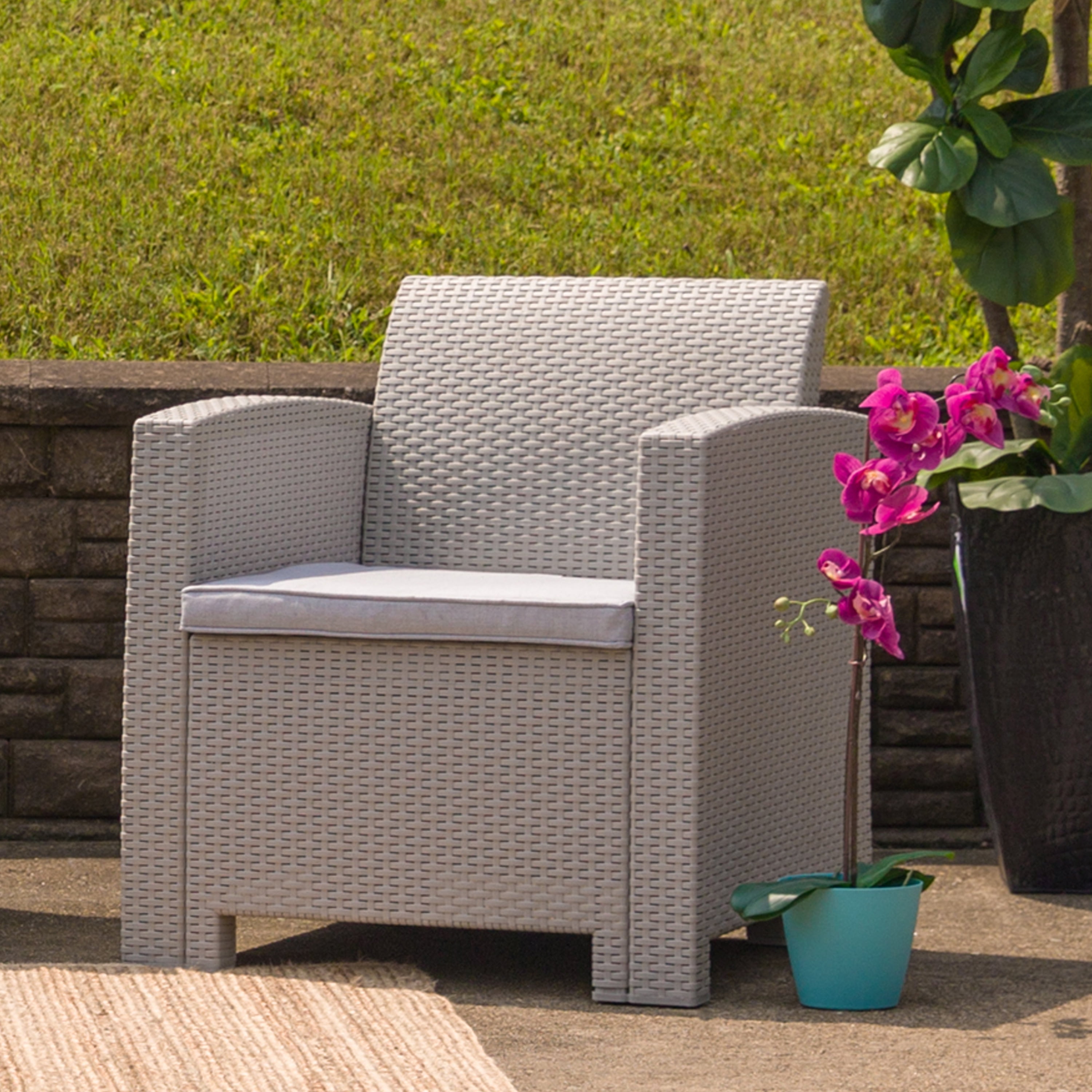 Contemporary Patio Armchair with Light Gray Cushions and Plastic Feet