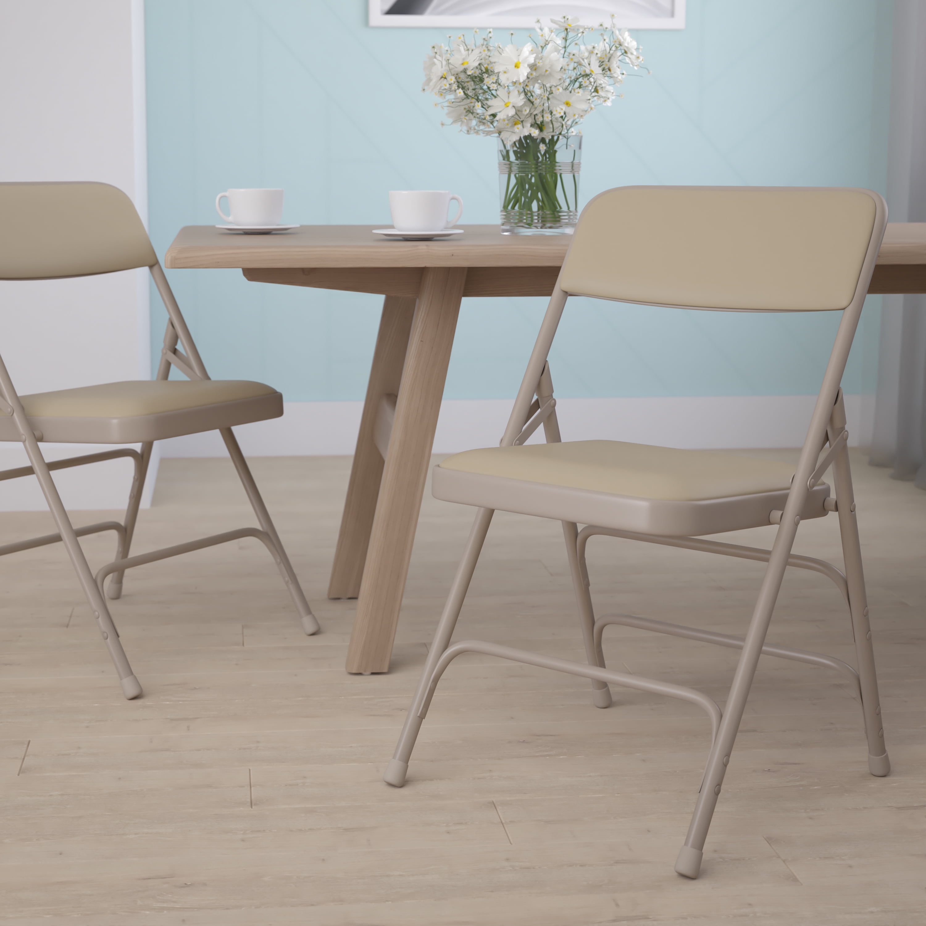 Flash Furniture HERCULES Series Curved Triple Braced & Double Hinged Beige Vinyl Metal Folding Chair