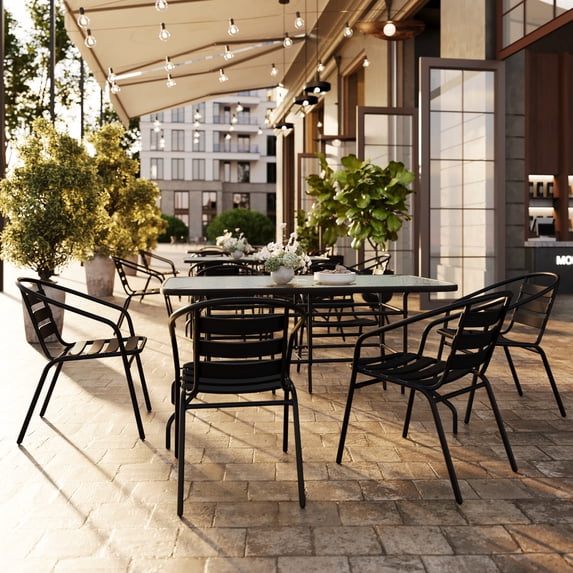 Flash Furniture 7 Piece Outdoor Patio Dining Set - 55" Tempered Glass Patio Table with Umbrella Hole, 6 Black Metal Aluminum Slat Stack Chairs