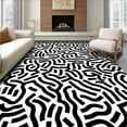 thumbnail image 1 of ODIKA 3'x5' Machine Washable Non-Slip Area Rug, Intricate Interlocking Cowhide Inspired High Traffic Rug, Black, 298827, 1 of 7