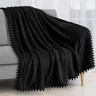 Black pom pom throw sale