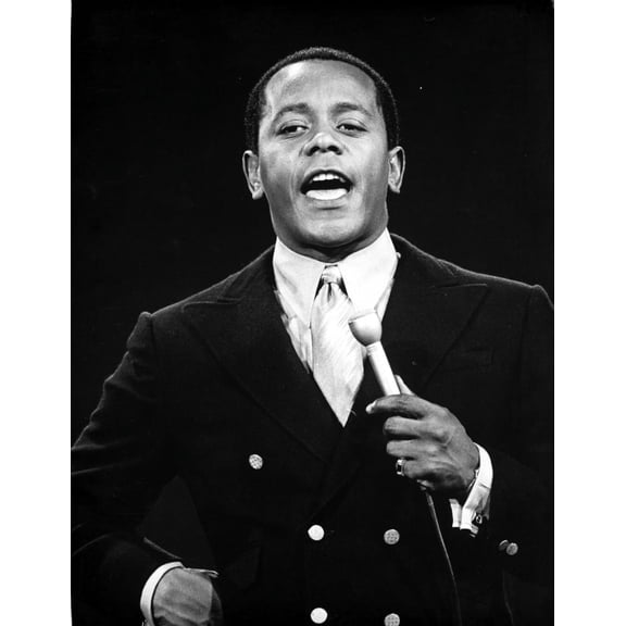 Flip Wilson on stage with a microphone Photo Print (24 x 30)