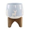 thumbnail image 1 of Flora Bunda 6.75" Ceramic Christmas Planter on wood Stand Light Blue, 1 of 5