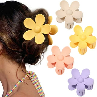 Super cute daisy flower hairclip that I added some glitter spray paint to.  So cute that way.