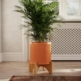 thumbnail image 1 of Fluted Metal Planter Pot With Arch Wood Base - Terracotta Color - 12.5"H x 9.75"W, 1 of 4