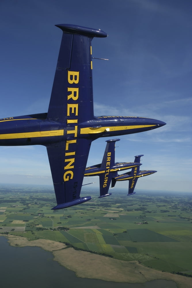 Flying with the Aero L-39 Albatros of the Breitling Jet Team Canvas Art - Daniel KarlssonStocktrek Images (12 x 18)
