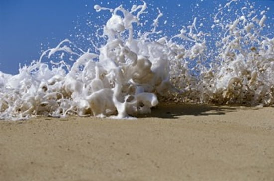 Foam splashing on the beach Canvas Art - Panoramic Images (42 x 28)
