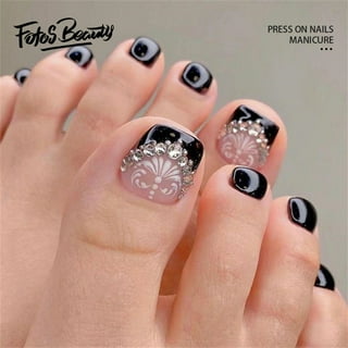 Premium Photo  Beautiful female feet with pedicure nails, white gel  polish, glitter design