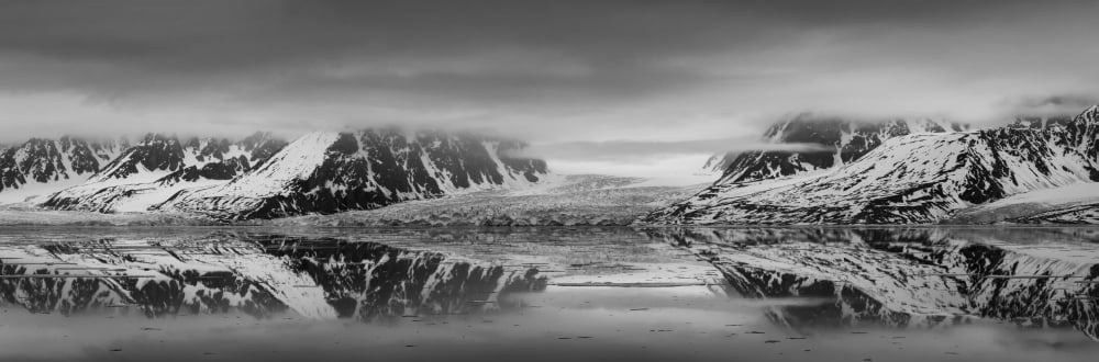 Fog and mountains near the Monaco Glacier Spitsbergen Svalbard Islands Norway Canvas Art - Panoramic Images (27 x 9)