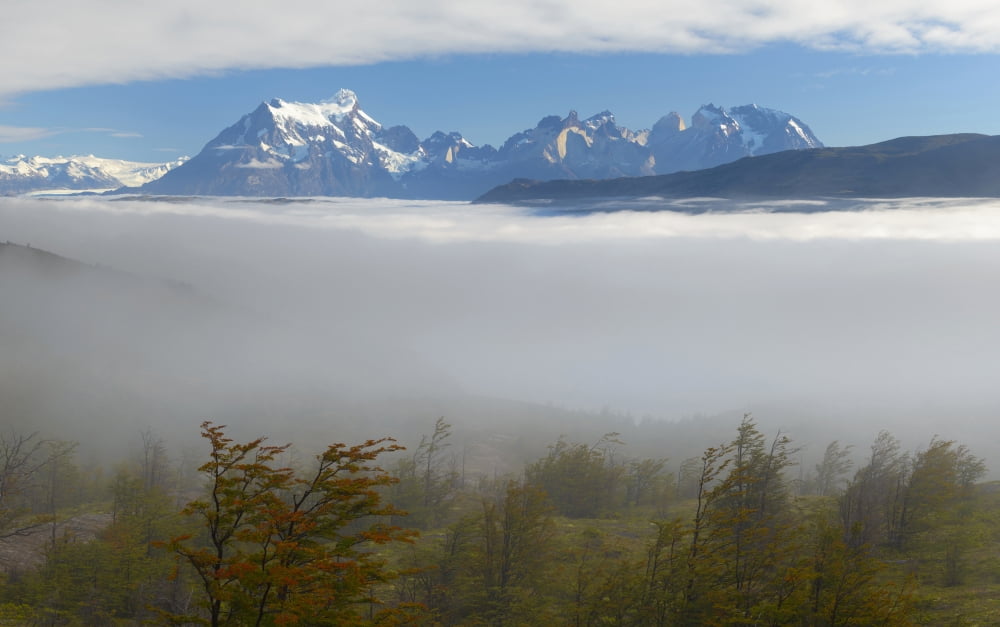 Fog blanket the lowlands below the Torres del Paine massif Torres Del Paine National Park Chile Canvas Art - Panoramic Images (15 x 24)