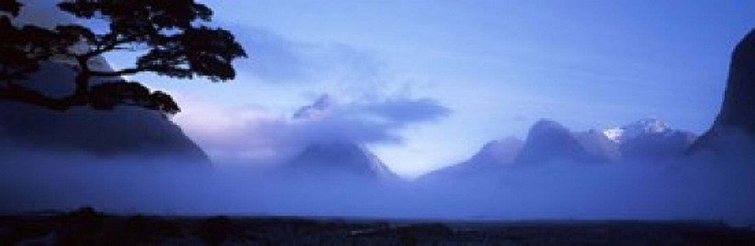 Fog over mountains Milford Sound Fiordland National Park South Island New Zealand Canvas Art - Panoramic Images (18 x 6)