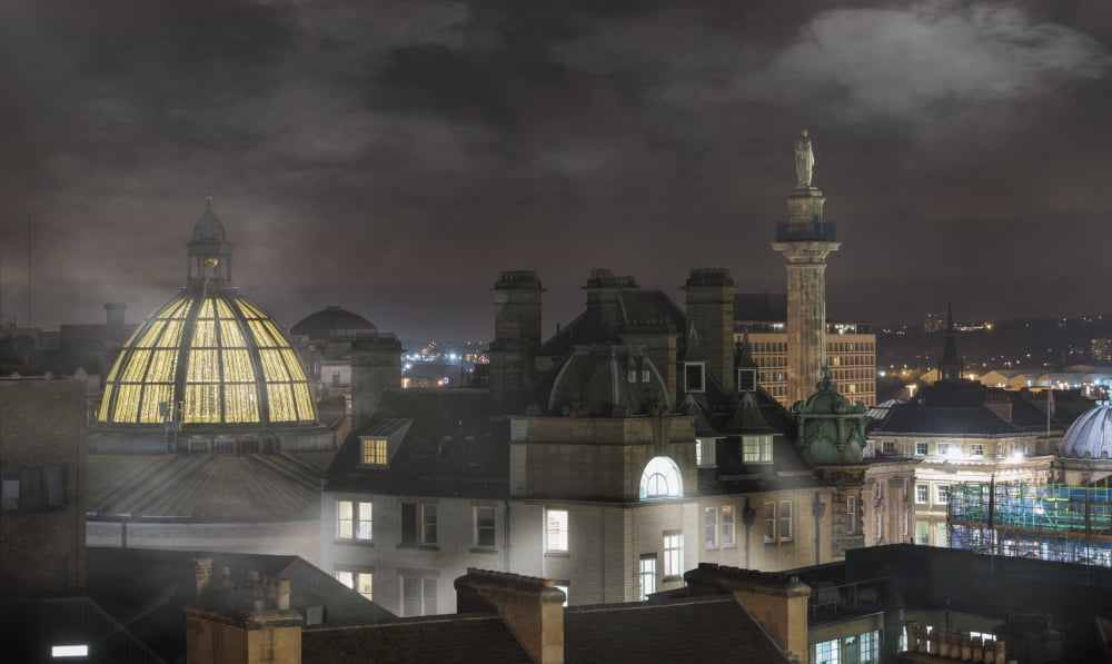 Fog sets in over buildings at nighttime Newcastle Northumberland England Canvas Art - John Short Design Pics (20 x 12)