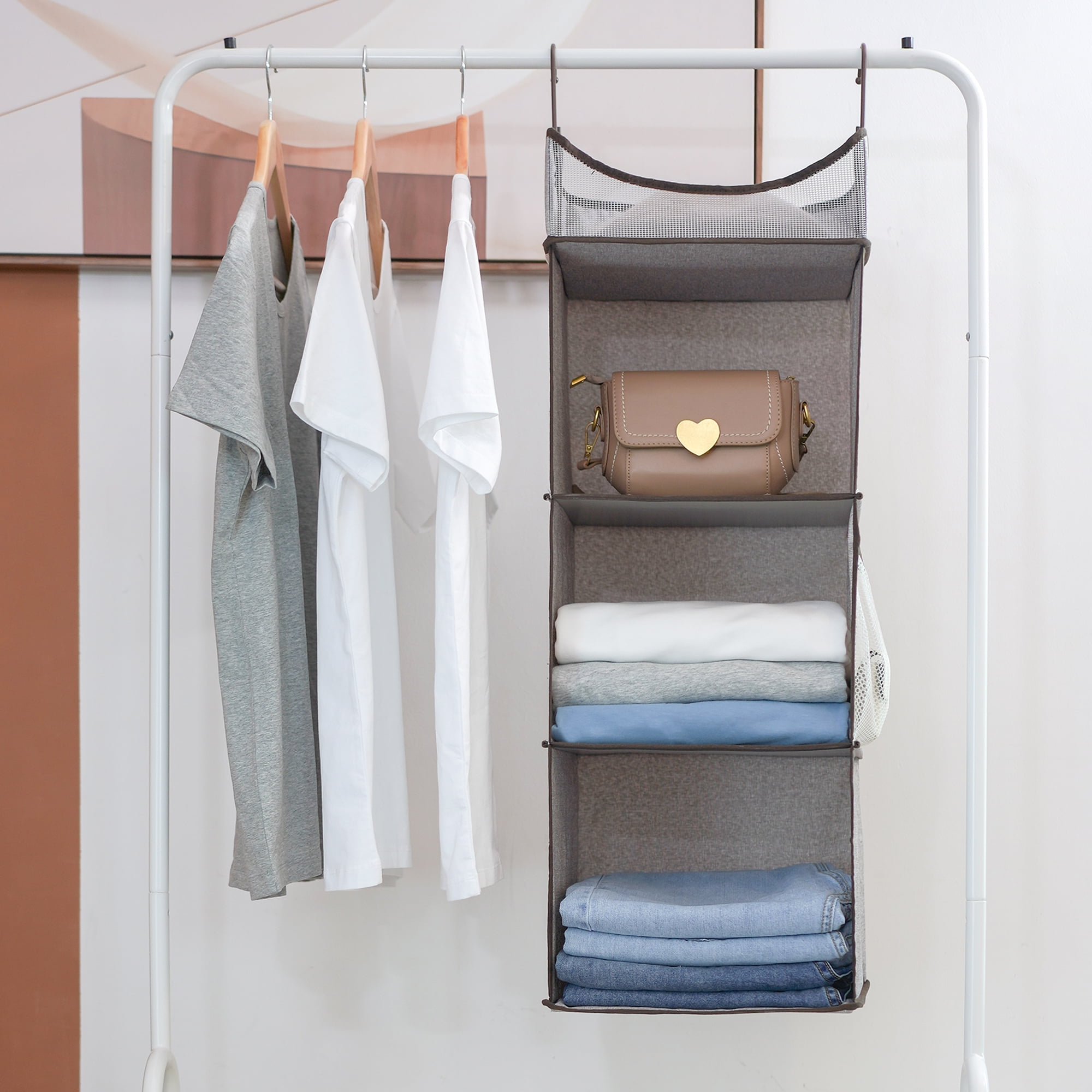 https://i5.walmartimages.com/seo/Foldable-Hanging-Closet-Organizer-with-Thickened-Board-3-Shelf-Gray-Polyester-Canvas-12-W-x-12-L-x-31-H_5ebf5c20-cd1c-4613-8b8a-ca484292e5b3.80a174f1103198d5eef9c82f9ef2bbeb.jpeg