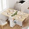 Folding dining table with storage, drop leaf design, 6 wheels, built-in drawer, cabinet and shelves, space-saving kitchen table for small spaces, apartment and kitchen use, white and natural finish
