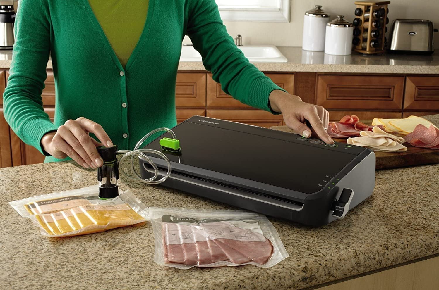 FoodSaver FM2100000 Vacuum Sealer Machine with Food Sealing Cutter