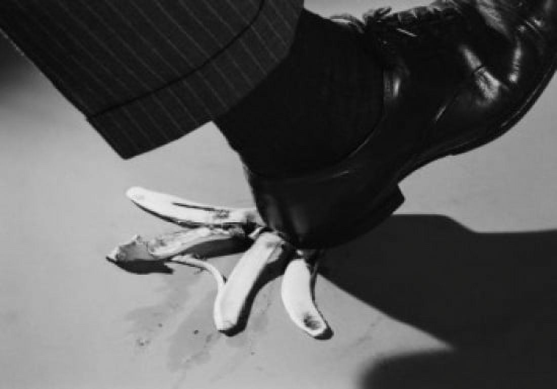 Foot of man about to step on banana peel Canvas Art - (24 x 36)