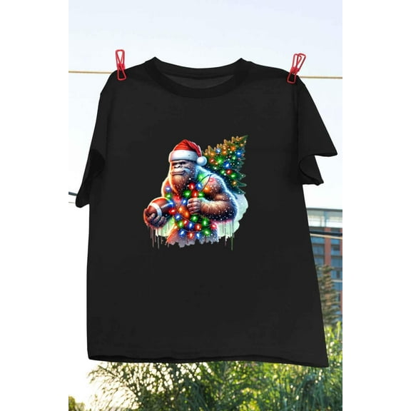 Football Bigfoot Christmas Sasquatch Funny Holiday Unisex T-Shirt up to 5XL