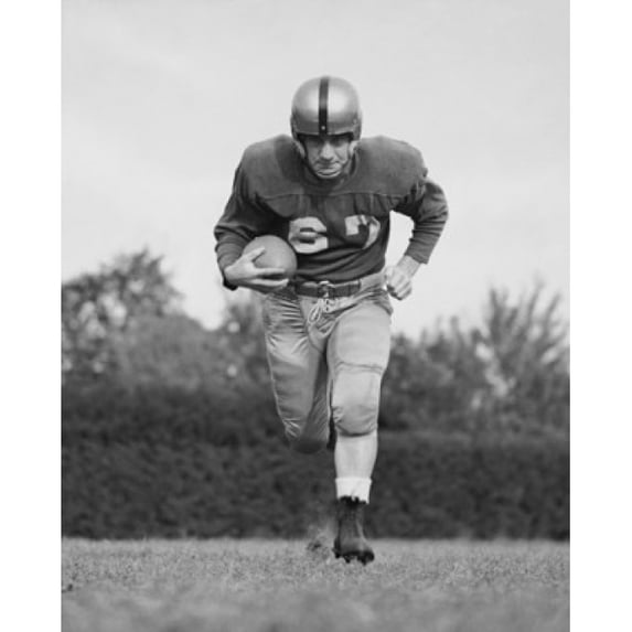 Football player running with a football on a football field Poster Print (18 x 24)