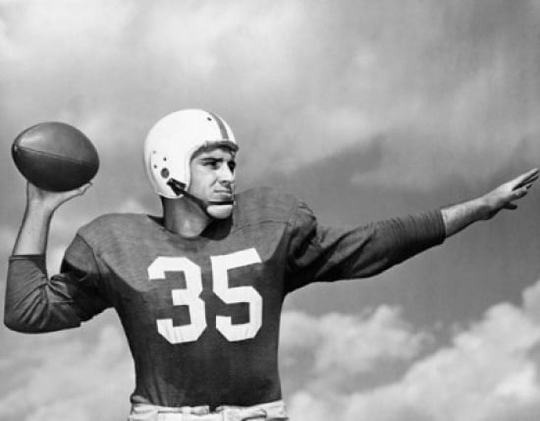 Football player throwing a football Canvas Art - (24 x 36)